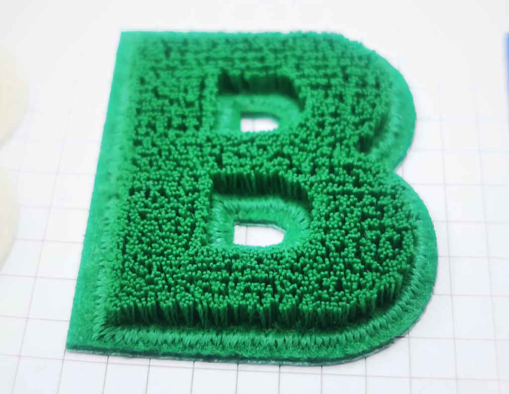 Zahnbürsten-Stickerei