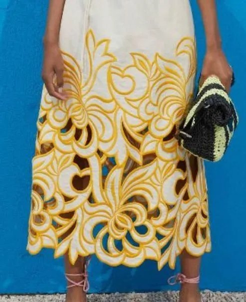 Ihr Produktionspartner: Warum Tuozhen Clothing die richtige Wahl für Lochstickerei (Eyelet Embroidery) ist